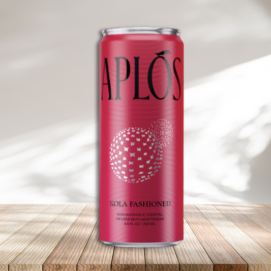 Aplos Kola Fashioned red can on wooden platform against white background