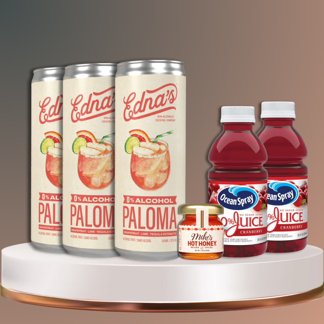 3 cans of Edna's Paloma, Mikes Hot Honey jar, and 2 bottles of Ocean Spray Cranberry Juice