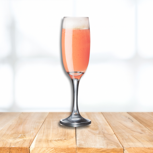 Pink fizzy drink in flute on wooden platform  with white background